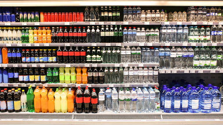 Shelf stacked with drinks
