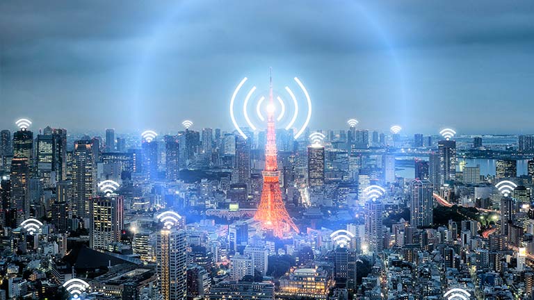 IoT WiFi icons over cityscape