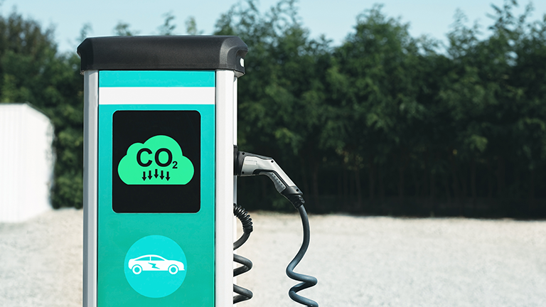 an EV charger with CO2 sign