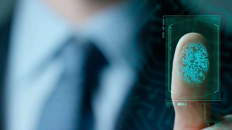 Person going through security using IoT-enabled thumbprint scanning technology