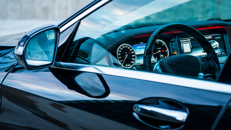 view of a car inside through the driver's window