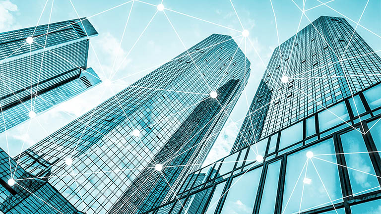 A low angle photo of high rise office buildings