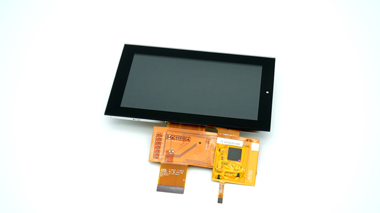 A 5” display screen with black border and yellow interface against a white background. 