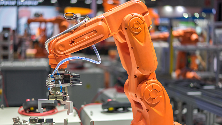 Industrial robot performing task Industrial robot performing task