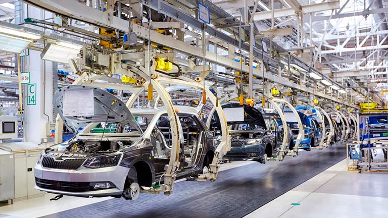 cars being built in automated factory